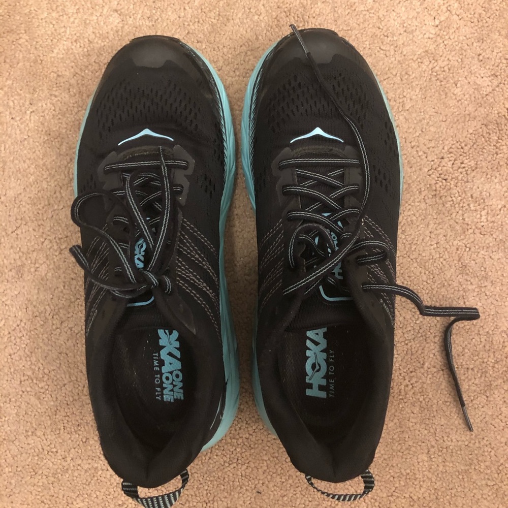 Black and blue hoka one one Clifton 6
